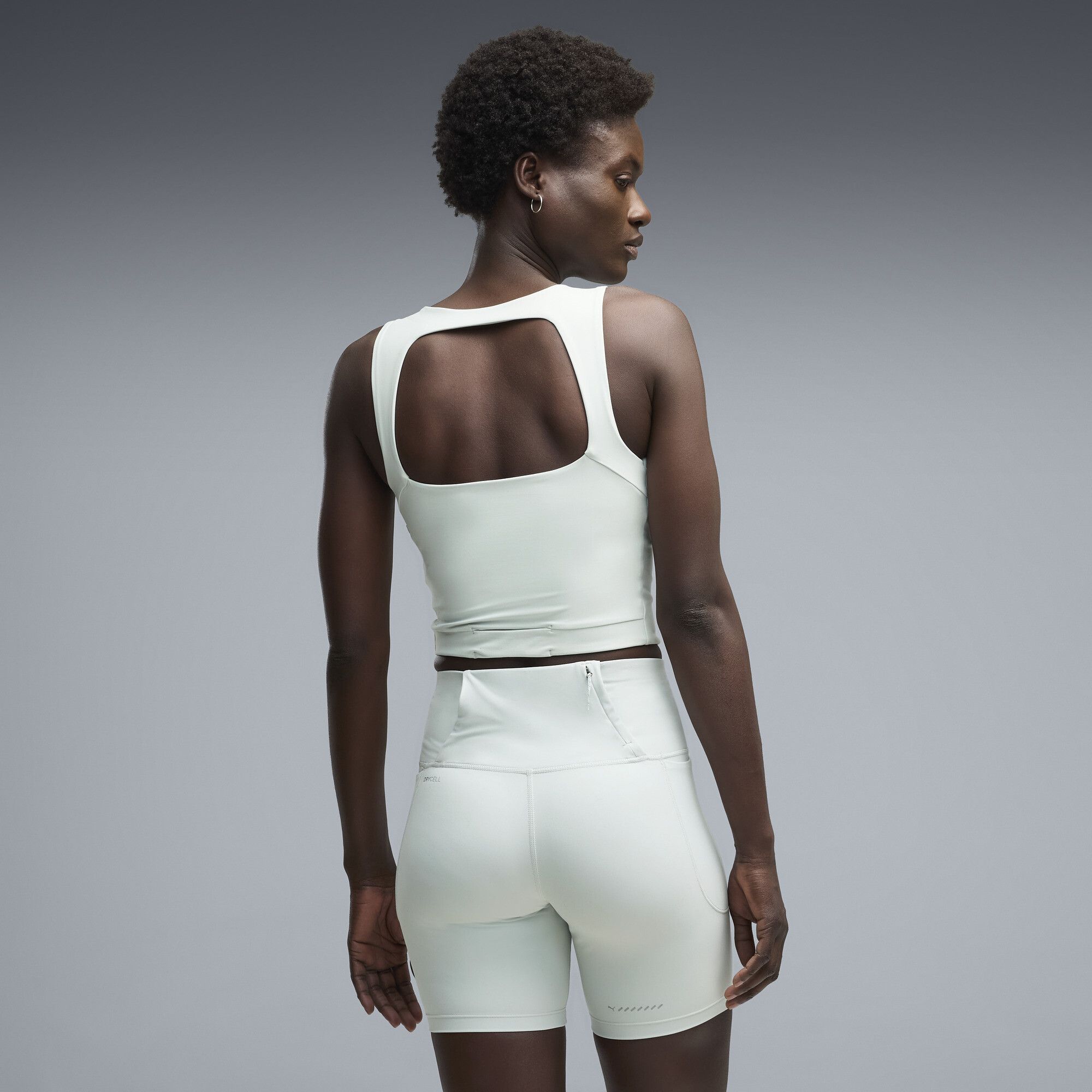 Camiseta de running crop de tirantes LIGHTSTRIDE para mujer, Ropa, Verde, XXS - PUMA - Modalova