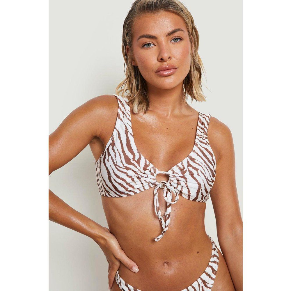 Top bikini con scollo profondo, laccetti e stampa tigrata - boohoo - Modalova