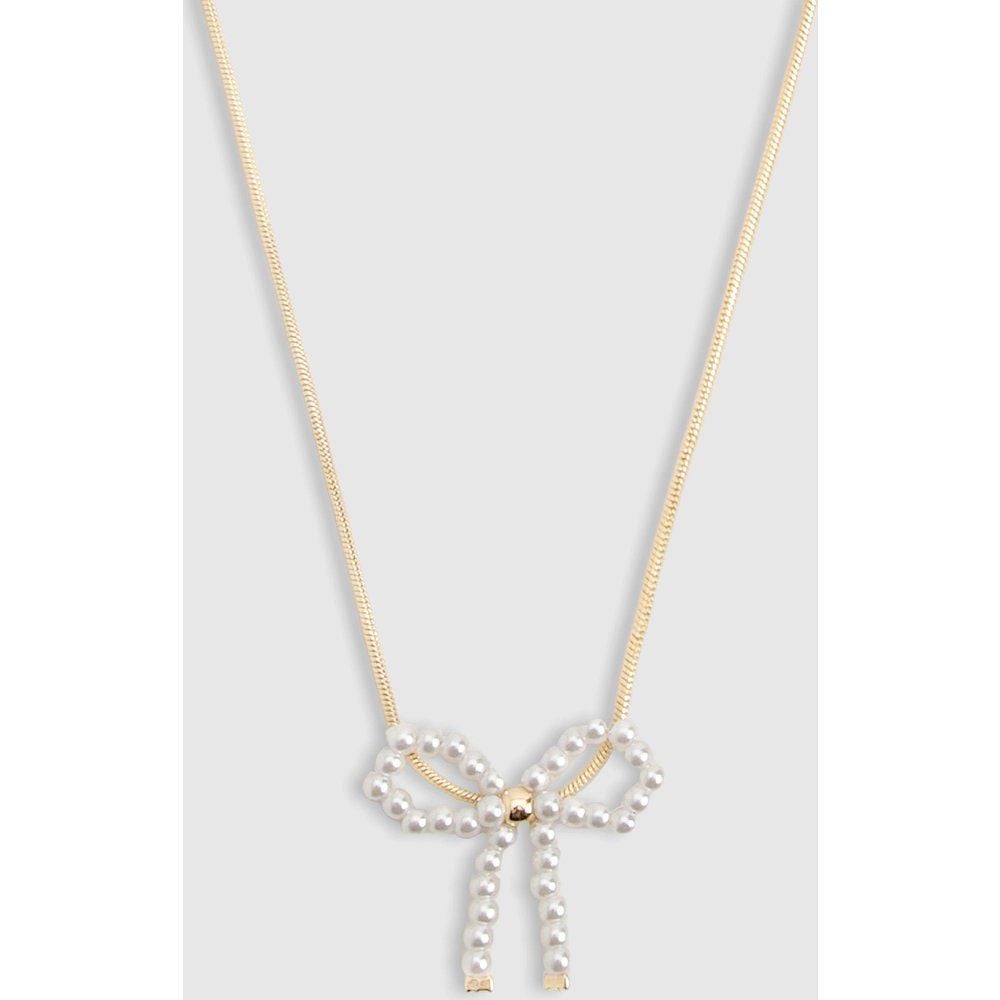 Delicate Gold Pearl Detail Bow Necklace - boohoo - Modalova