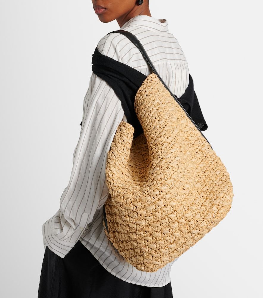 Leather-trimmed raffia and paper bucket bag - Toteme - Modalova