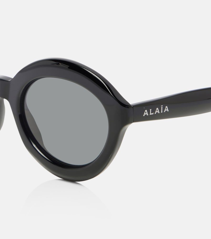 Alaïa Runde Sonnenbrille Lettering Logo - Alaia - Modalova