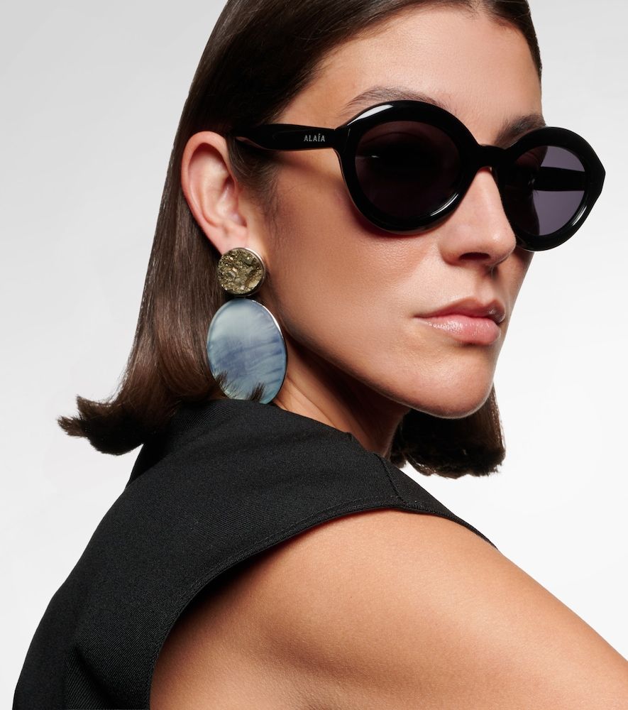 Alaïa Runde Sonnenbrille Lettering Logo - Alaia - Modalova