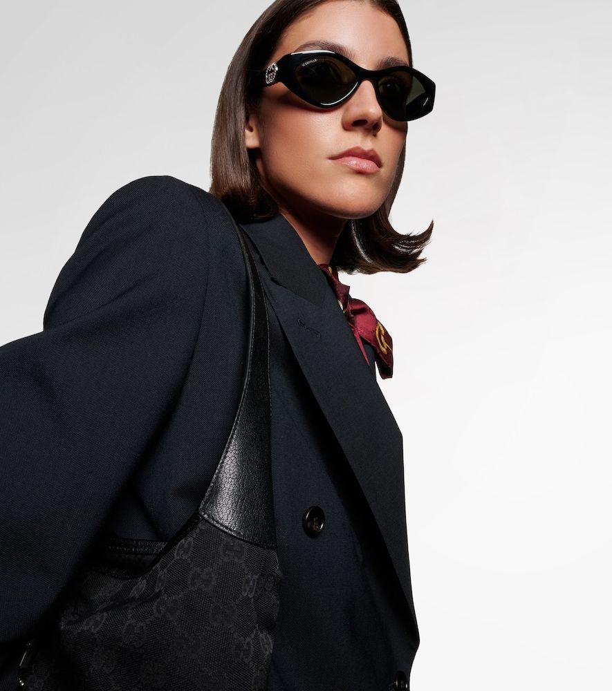 Occhiali da sole ovali Interlocking G con cristalli - Gucci - Modalova