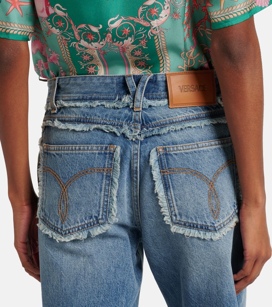 Jeans a gamba larga a vita media - Versace - Modalova