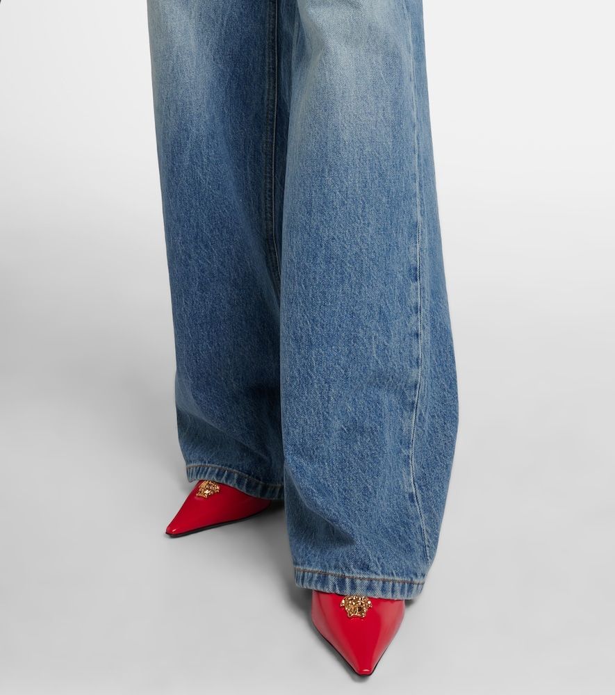 Jeans a gamba larga a vita media - Versace - Modalova