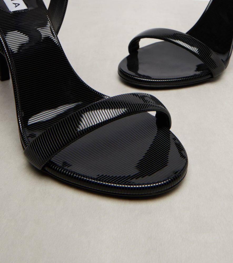 Chain trompe l'oil patent leather sandals - Alaia - Modalova