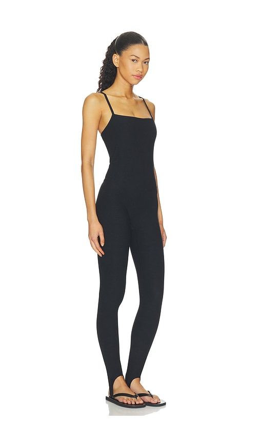 Spacedye Stirrup Jumpsuit in Black. - size XS (also in S, M, L) - Beyond Yoga - Modalova