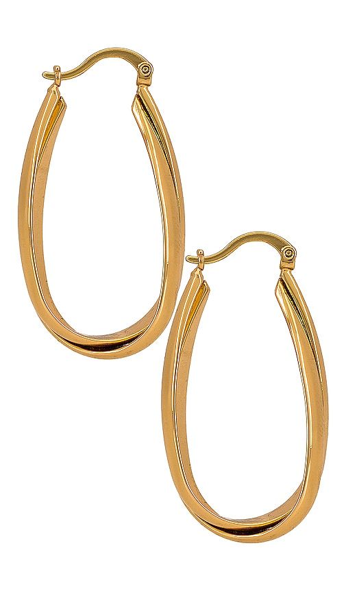 Oval Hoop Earring in Metallic - Ettika - Modalova