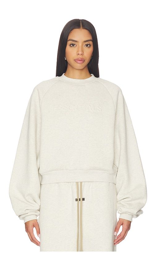 S Raglan Sweatshirt in Cream. - size M (also in XS, XXS) - Fear of God ESSENTIALS - Modalova
