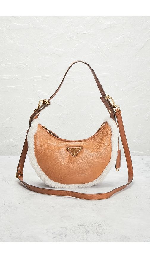 Prada Shearling Arque Shoulder Bag in - FWRD Renew - Modalova