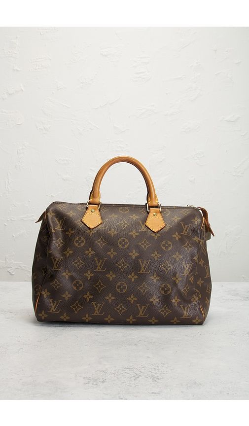 Louis Vuitton Monogram Speedy 30 Handbag in - FWRD Renew - Modalova