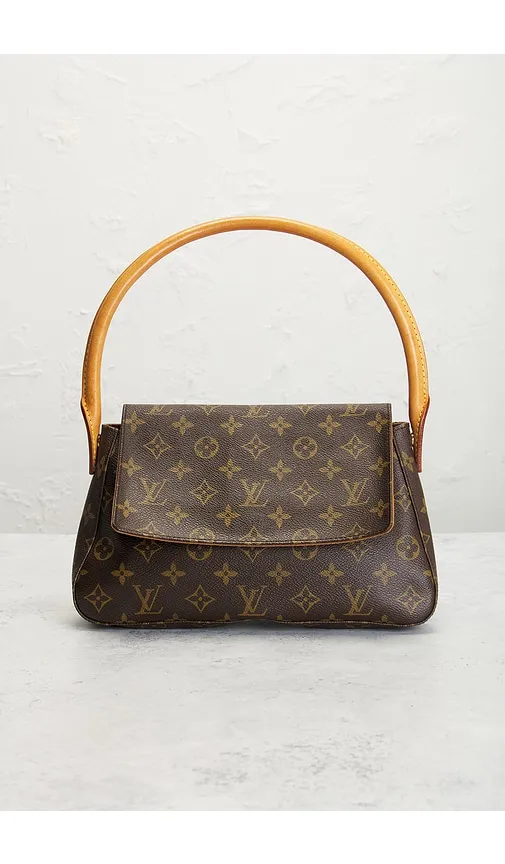 Louis Vuitton Monogram Mini Looping Shoulder Bag in - FWRD Renew - Modalova