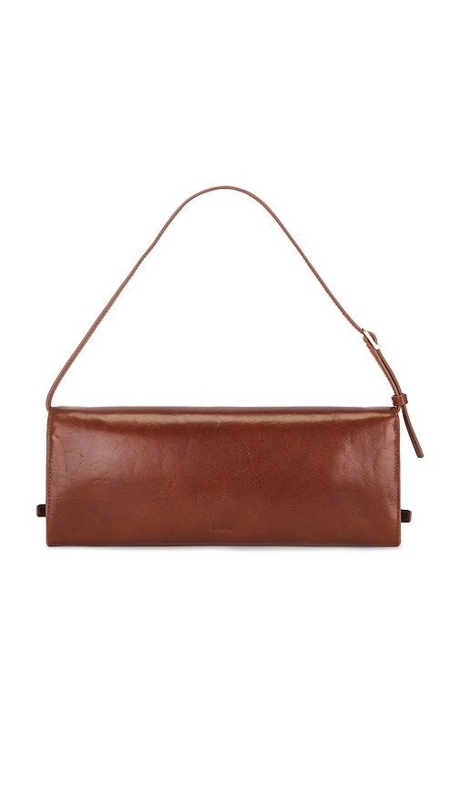 River East West Vachetta Leather Clutch in Cognac - SIMKHAI - Modalova