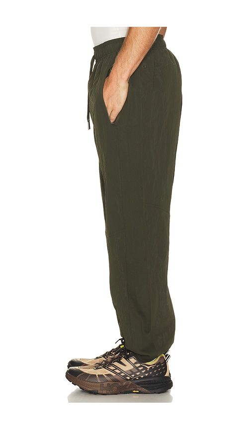 Crinkled Nylon Hybrid Track Pant in Dark Green. - size S (also in M, L, XL/1X) - lululemon - Modalova