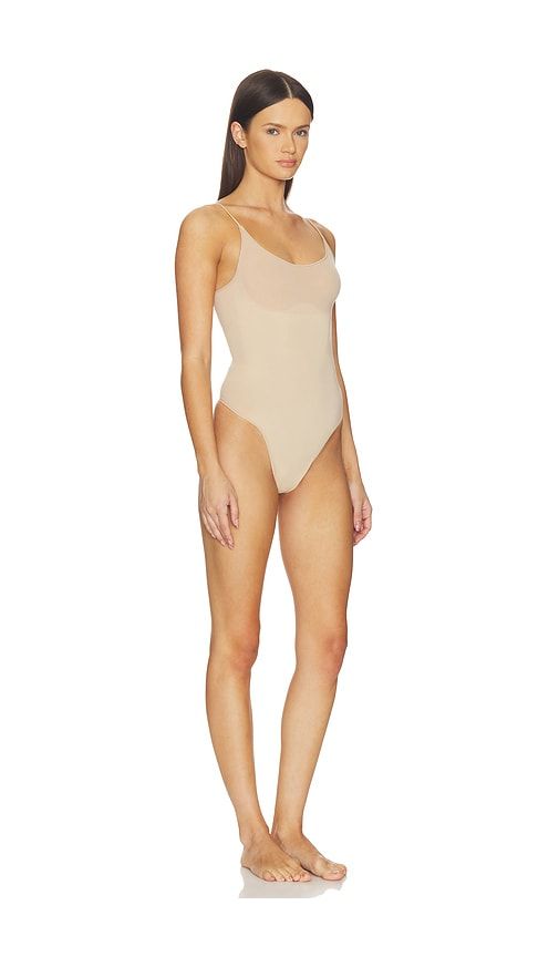 Sheer Seamless Thong Bodysuit in Nude. - size M (also in S, XS, XXL) - SKIMS - Modalova