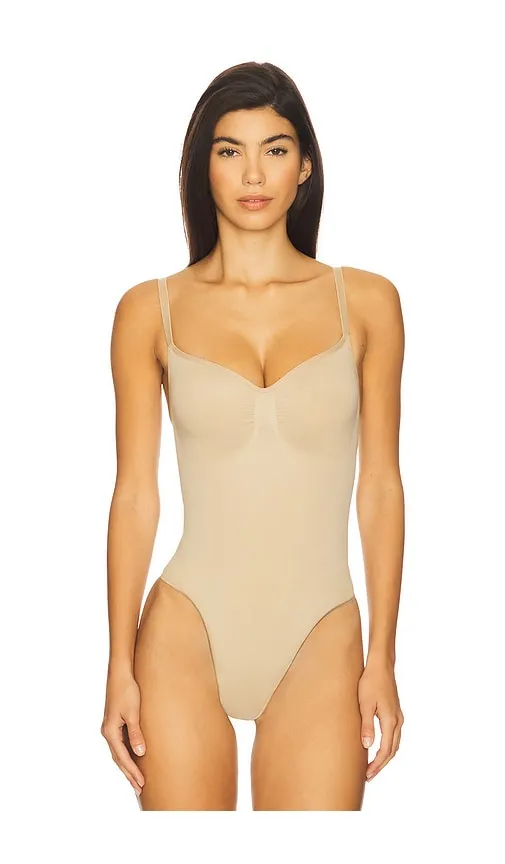 Seamless Sculpt Thong Bodysuit in Tan. - size 2X (also in L, M, S, XS, XXL, XXS) - SKIMS - Modalova