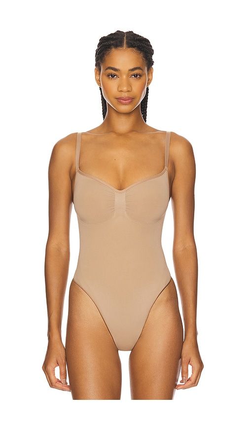 Seamless Sculpt Thong Bodysuit in Beige. - size L (also in M, S, XL, XS) - SKIMS - Modalova