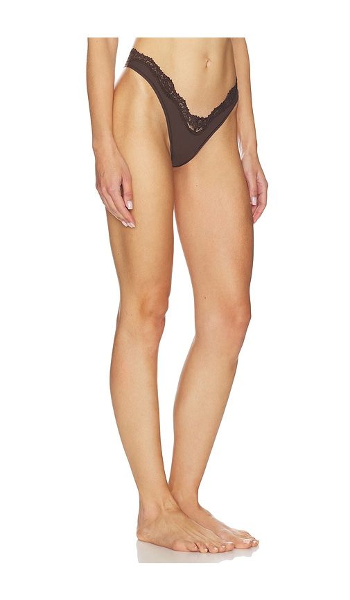 Fits Everybody Lace Dip Thong in Brown. - size L (also in XL) - SKIMS - Modalova