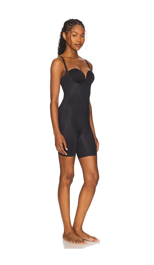 Shape Invisible Shaping Open-bust Mid-thigh Bodysuit in Black. - size 1X (also in XL) - SPANX - Modalova