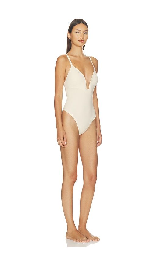 Suit Your Fancy Plunge Low Back Thong Bodysuit in Tan. - size M (also in S, XS, XXL/2X) - SPANX - Modalova